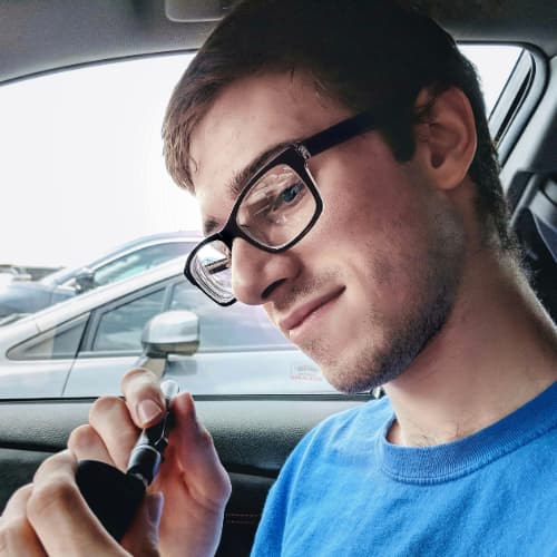 Me Cleaning my Camera Lens